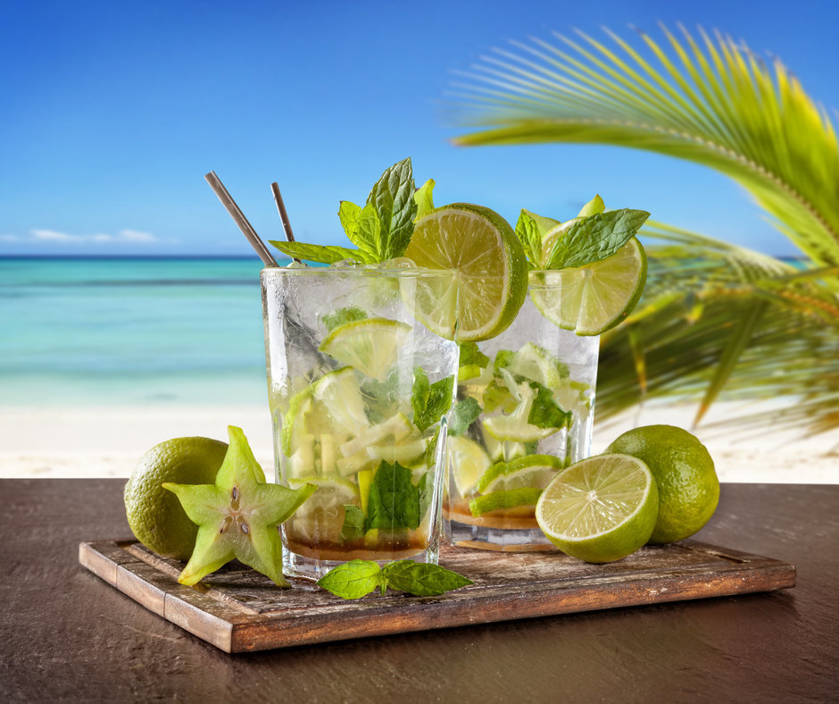 Summer drinks with blur beach on background